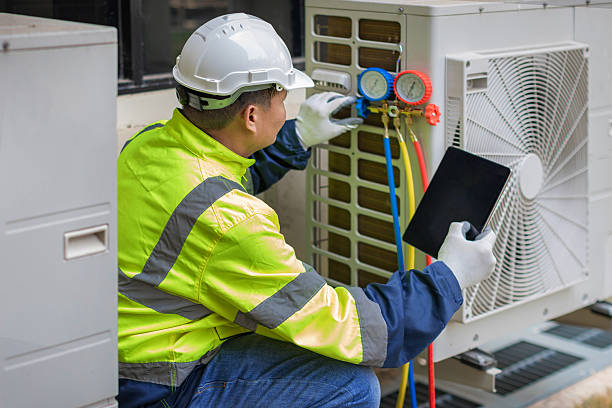 Professional Ac Installation technician working in Corcoran, MN